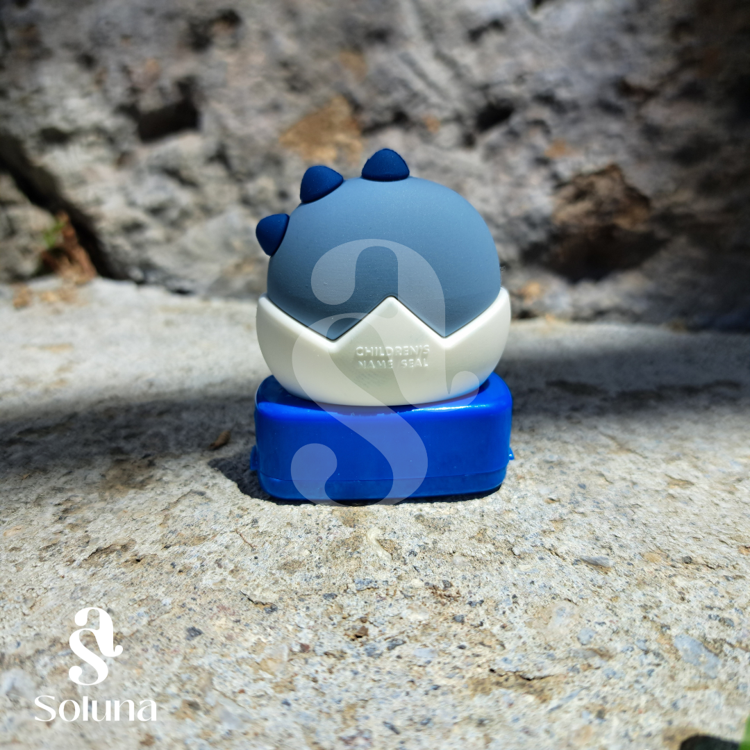 Sello dinosaurio azul kawaii
